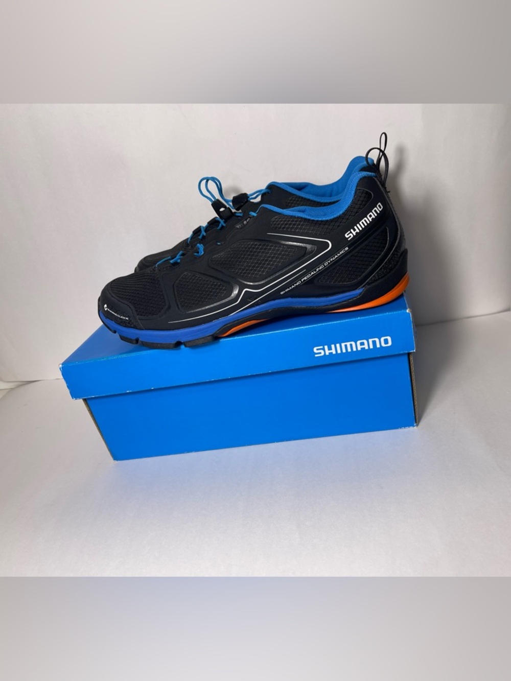Shimano Men's Pedaling Dynamics Cycling Shoes Black, Blue & Orange Size EU(42)